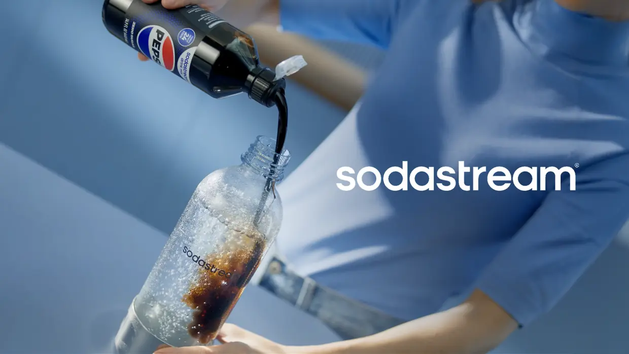 SodaStream Pepsi drink-mix launch creative, Pepsi pouring into a SodaStream bottle